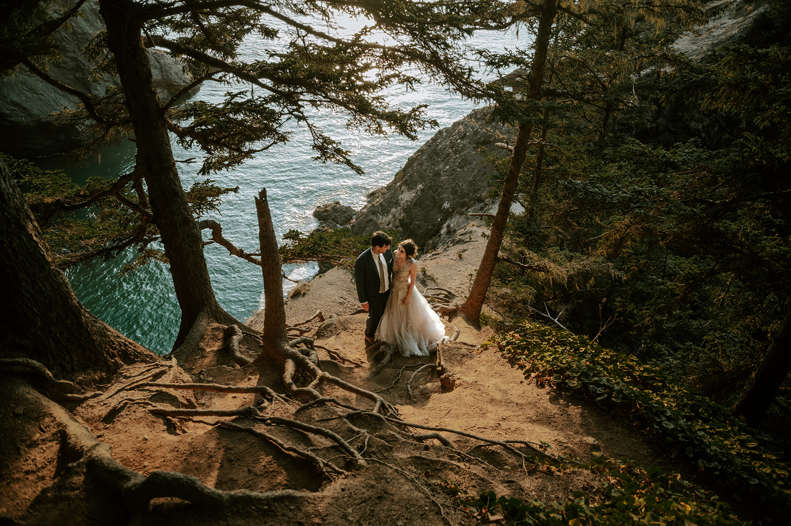 Bride and groom hiking for an adventure elopement on the Oregon coast At Samuel h boardman