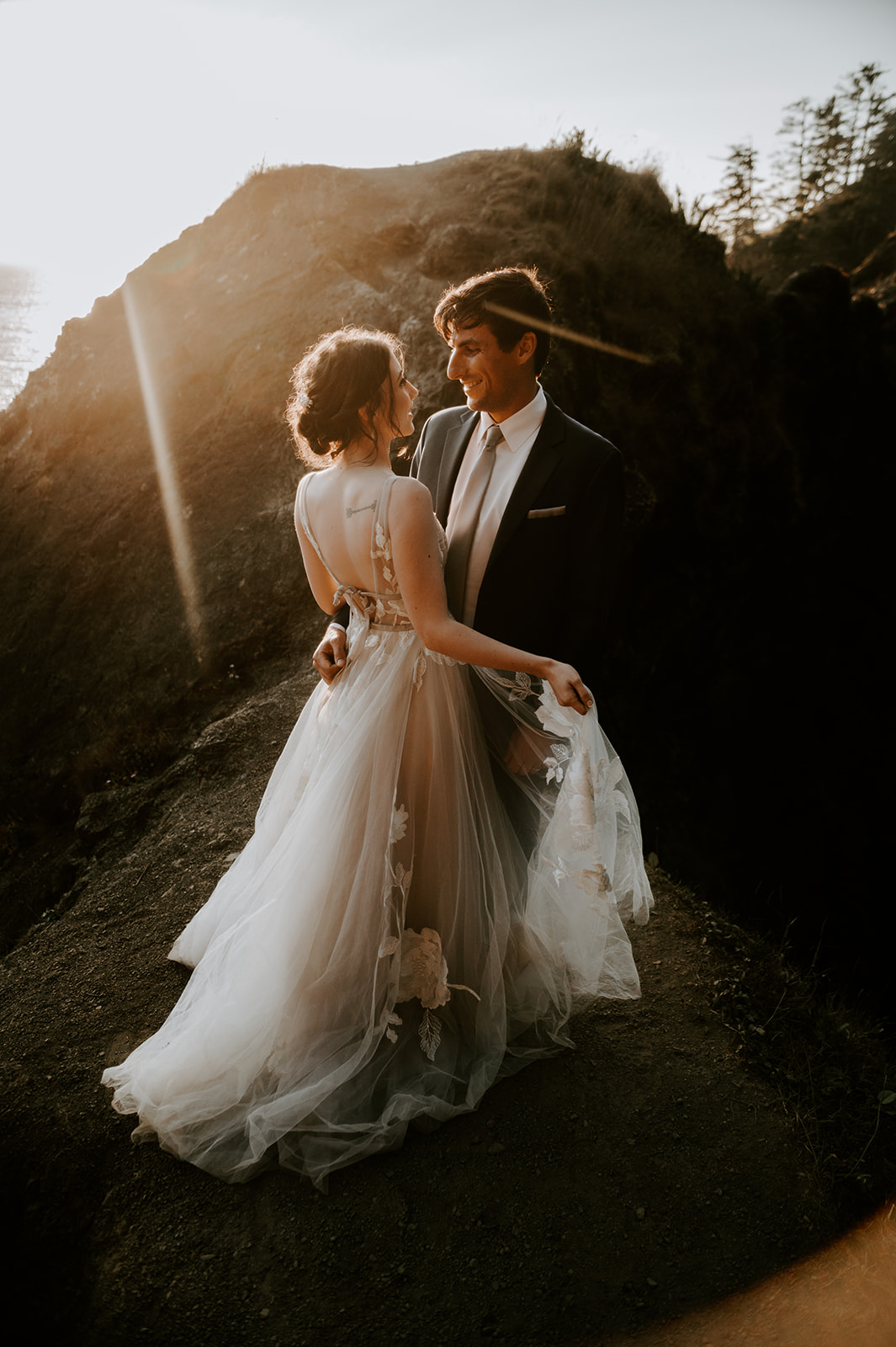 Bride and groom at sunset at the arches at Samuel h boardman on the Oregon coast