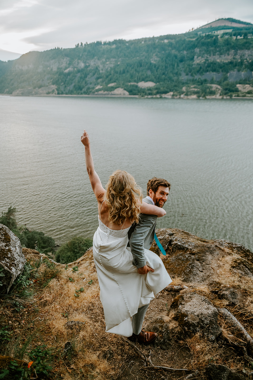Bride and groom celebrating at the Westcliff Lodge in the Colombia River Gorge