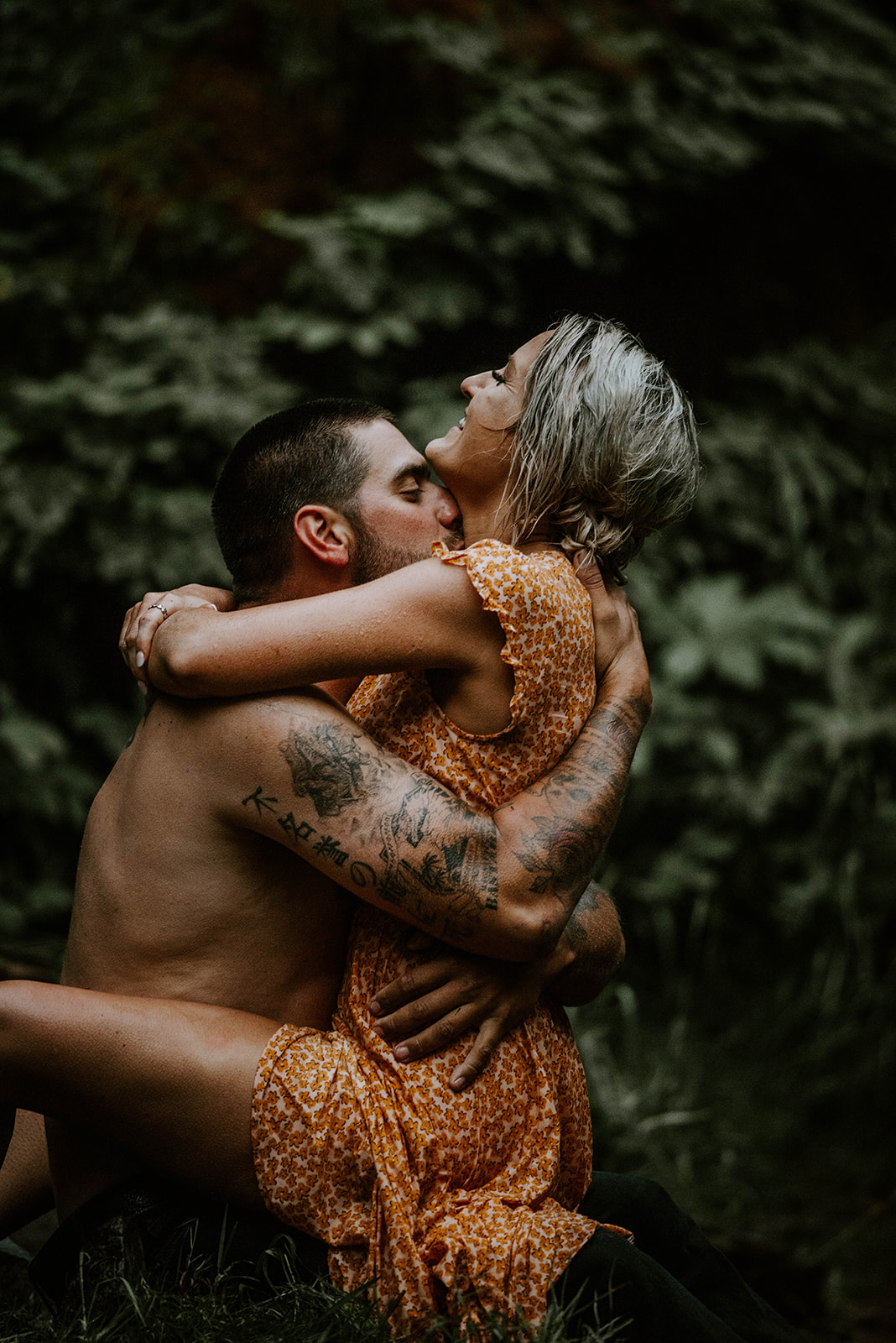A couple embracing at their engagement photo session in Oregon
