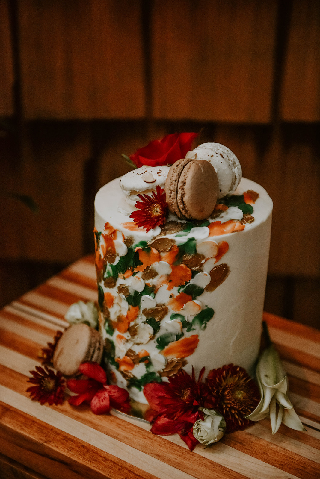 A autumn wedding cake with macoroons.