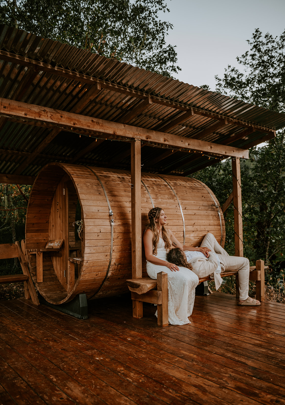 Bride and groom at the sauna at cedar bloom farms