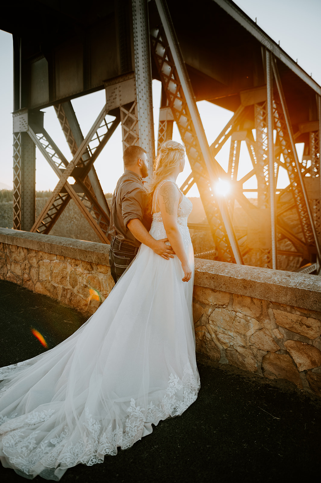 Bride and groom overlooking the peter Ogden state park at sunset