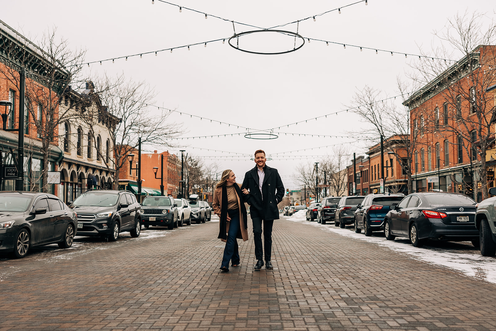 Courtney and Taylor walking in Downtown Fort Collins