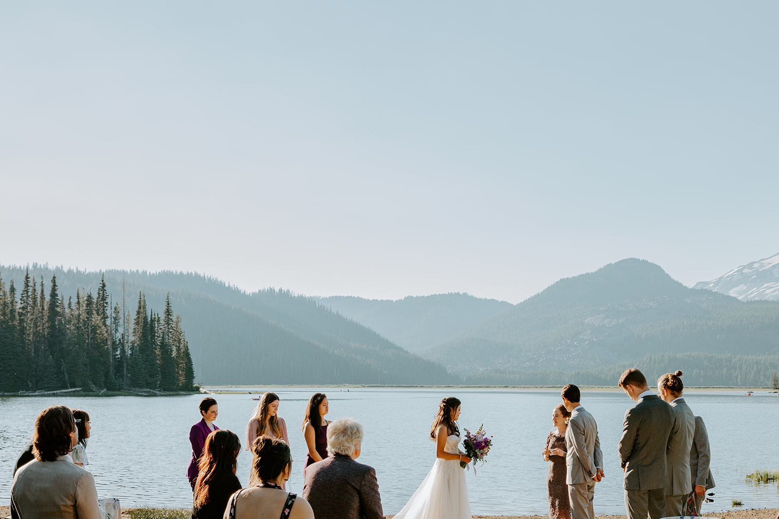 Couple having an elopement wedding at sparks lake in bend 