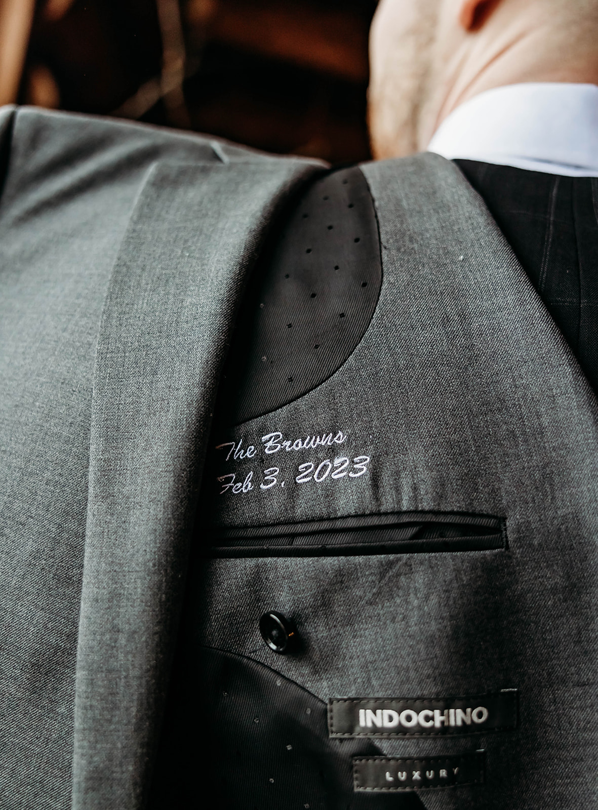 Embroidery on grooms jacket 