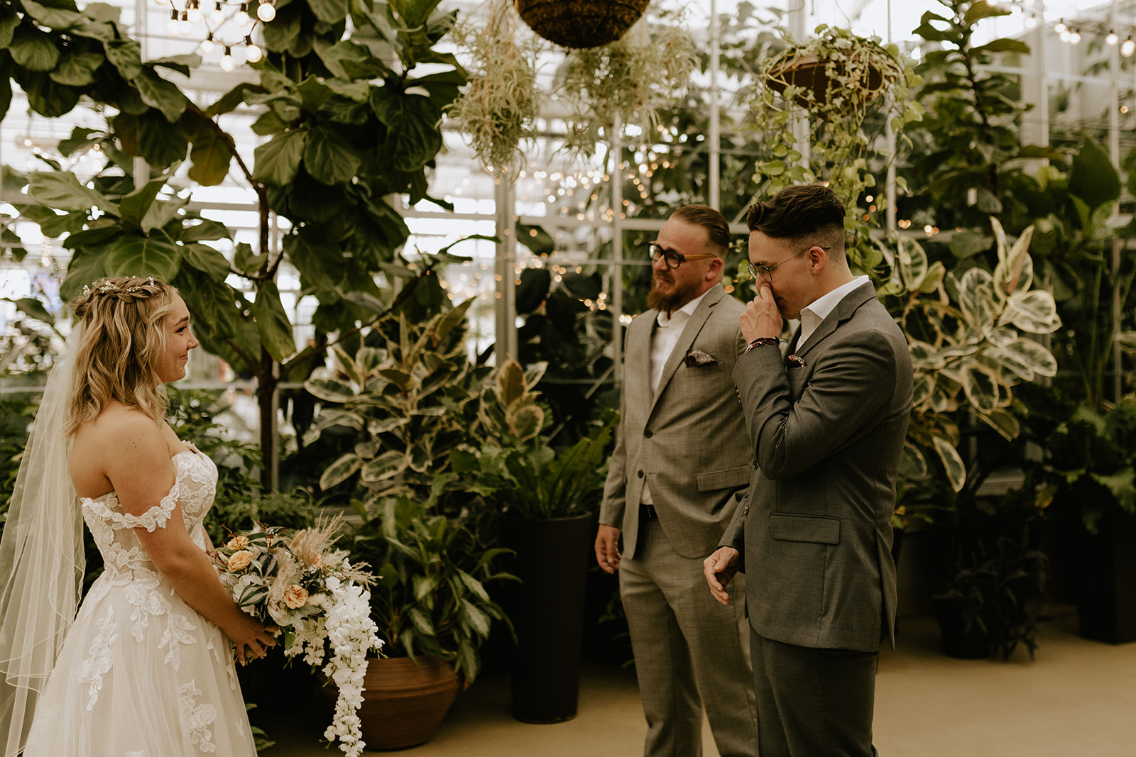 A couple getting married at the Downtown Market greenhouse in Grand Rapids, Michigan