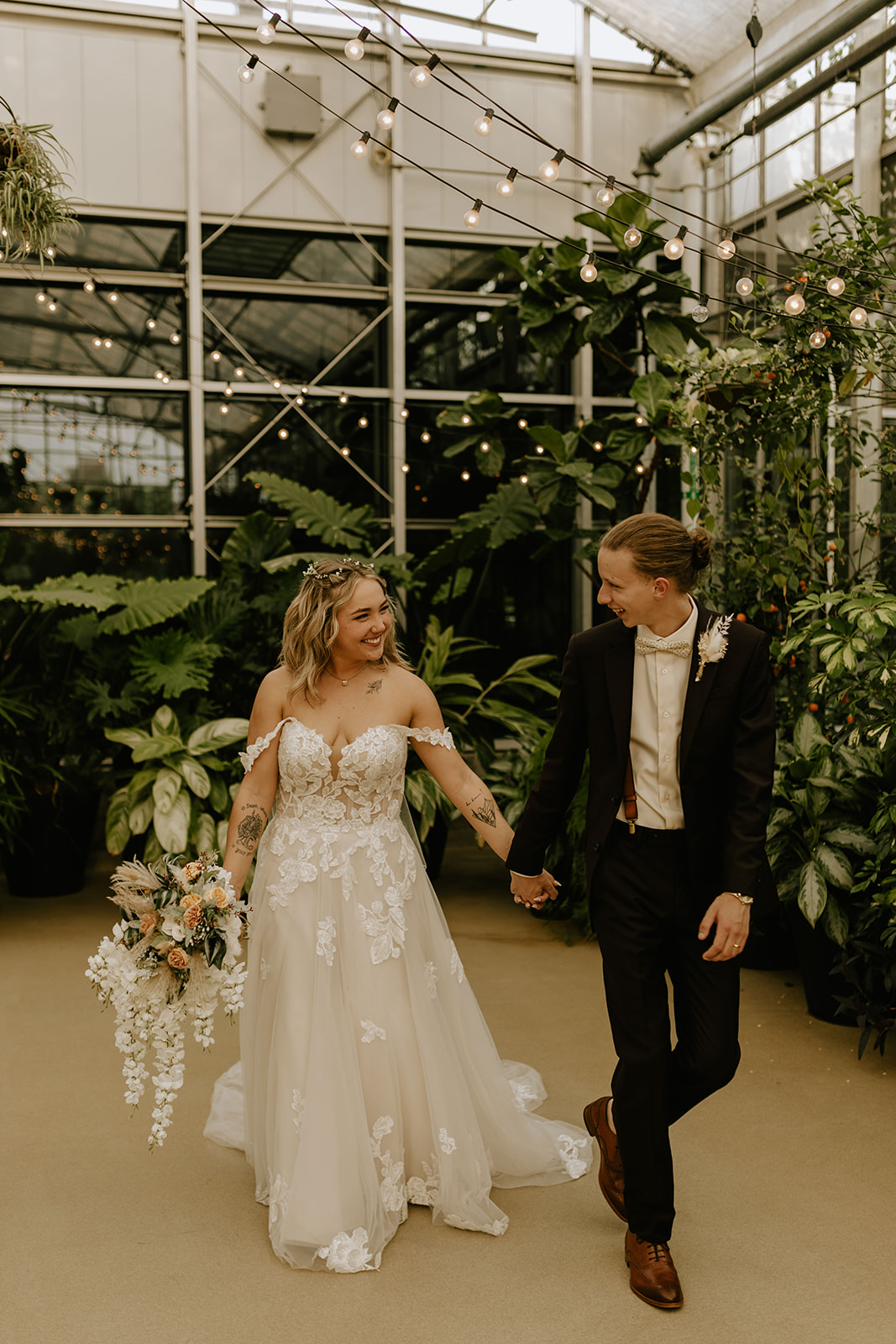 Artistic wedding photos at the Downtown Market greenhouse in Grand Rapids, Michigan