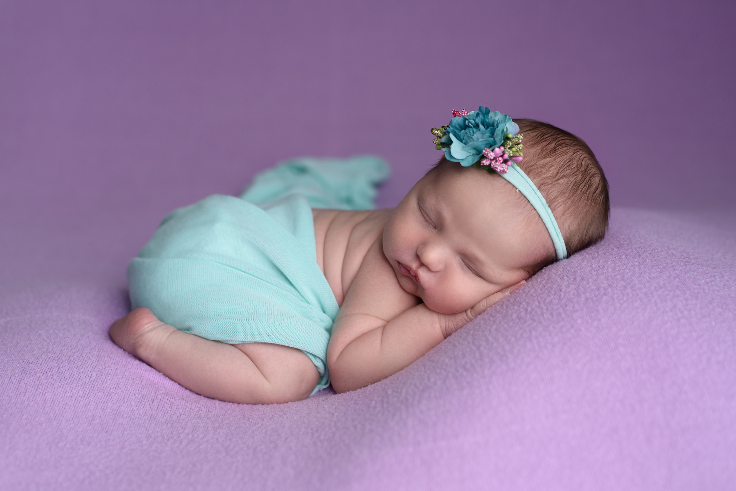 A vibrant color combination selected for baby girl Kelsey's newborn session with Rachel Mummert Photography