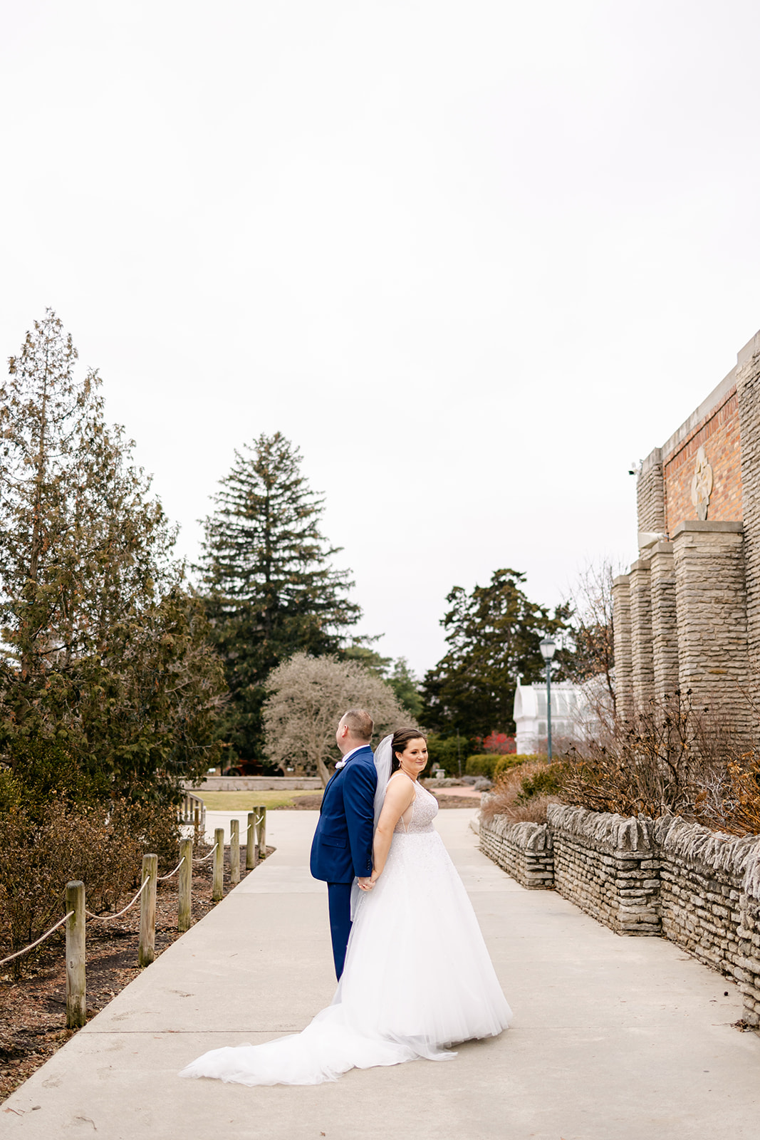 Bride and groom before the first look outside of the Aquarium at the Toledo Zoo by Michele Maloney Photography