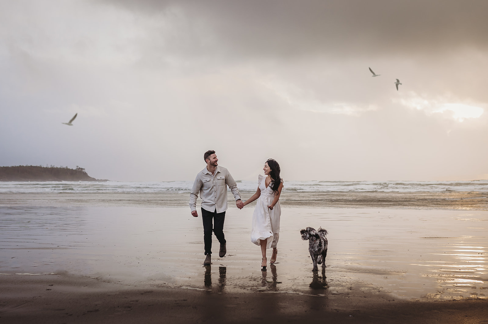 A couple who captured their engagement session on the West Coast shores of Cox Bay in Tofino, BC, Canada