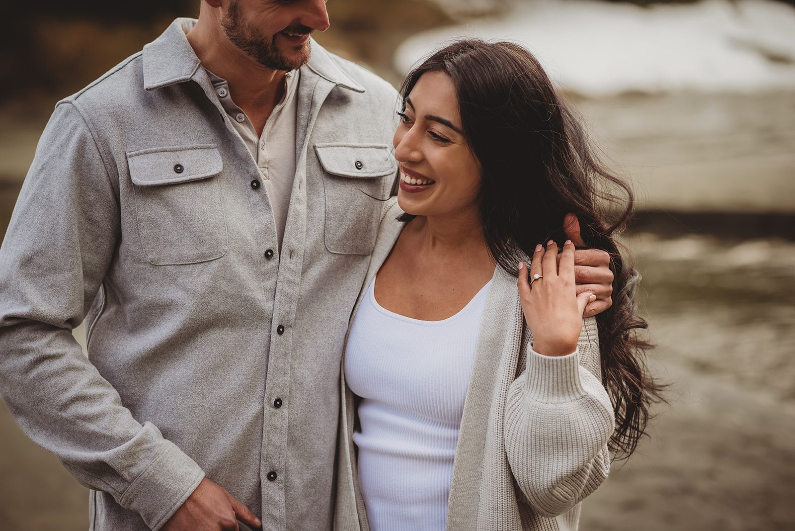 A couple who captured their engagement session on the West Coast shores of Cox Bay in Tofino, BC, Canada