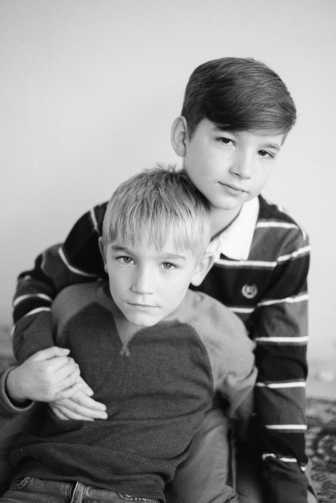 brothers pose for black and white portrait