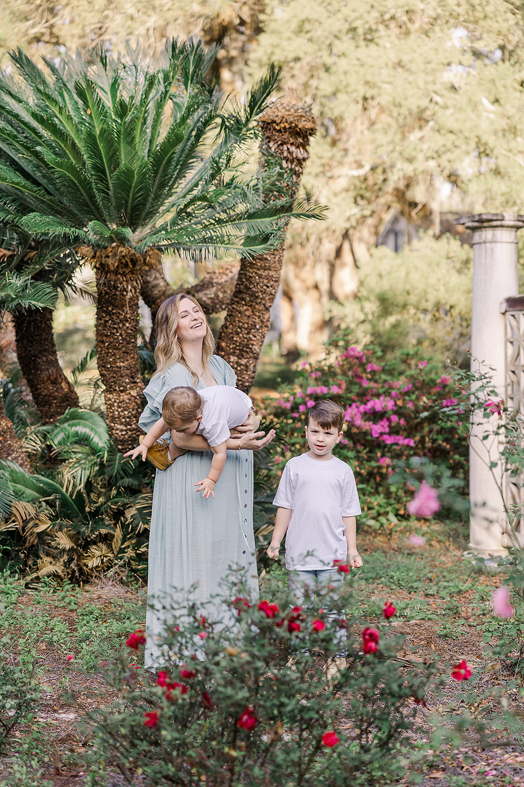 maternity photos of mom with two young boys at Goodwood Museum and Gardens