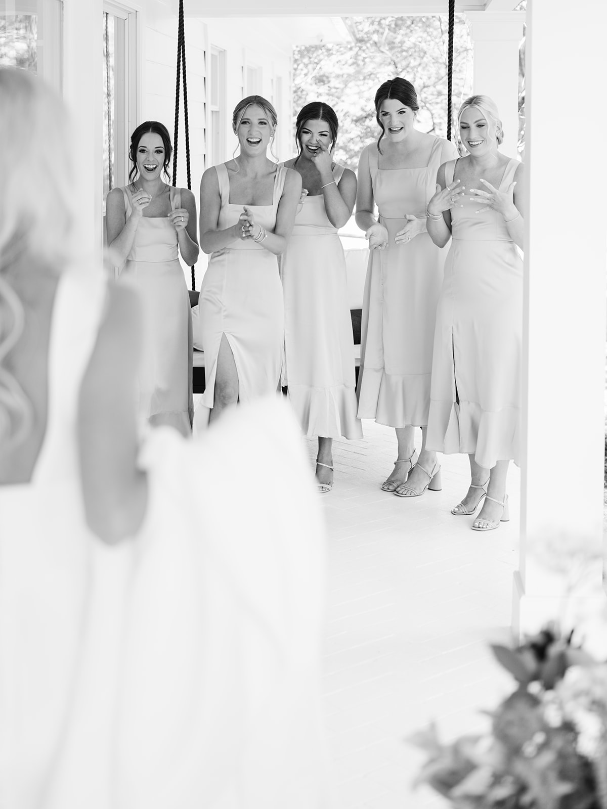 bridesmaids first look at tesori bridal dress