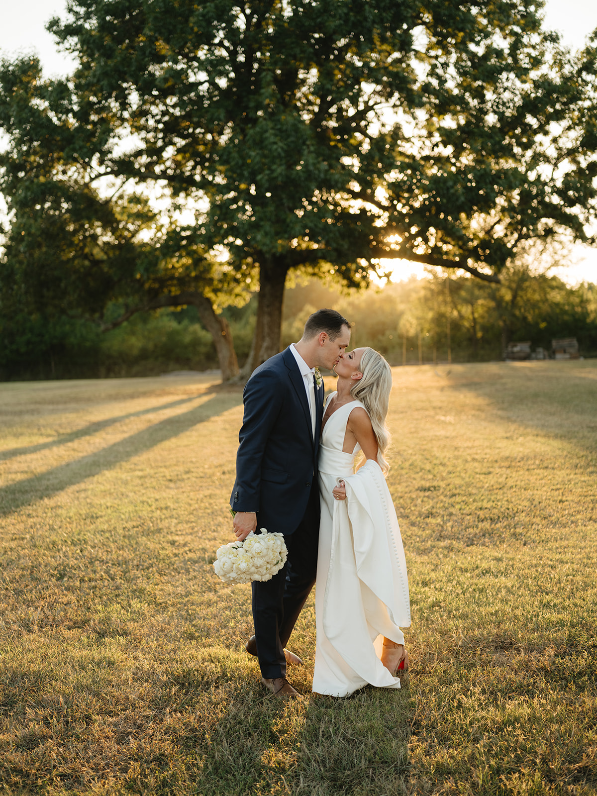 bride and groom at sunset in arkansas