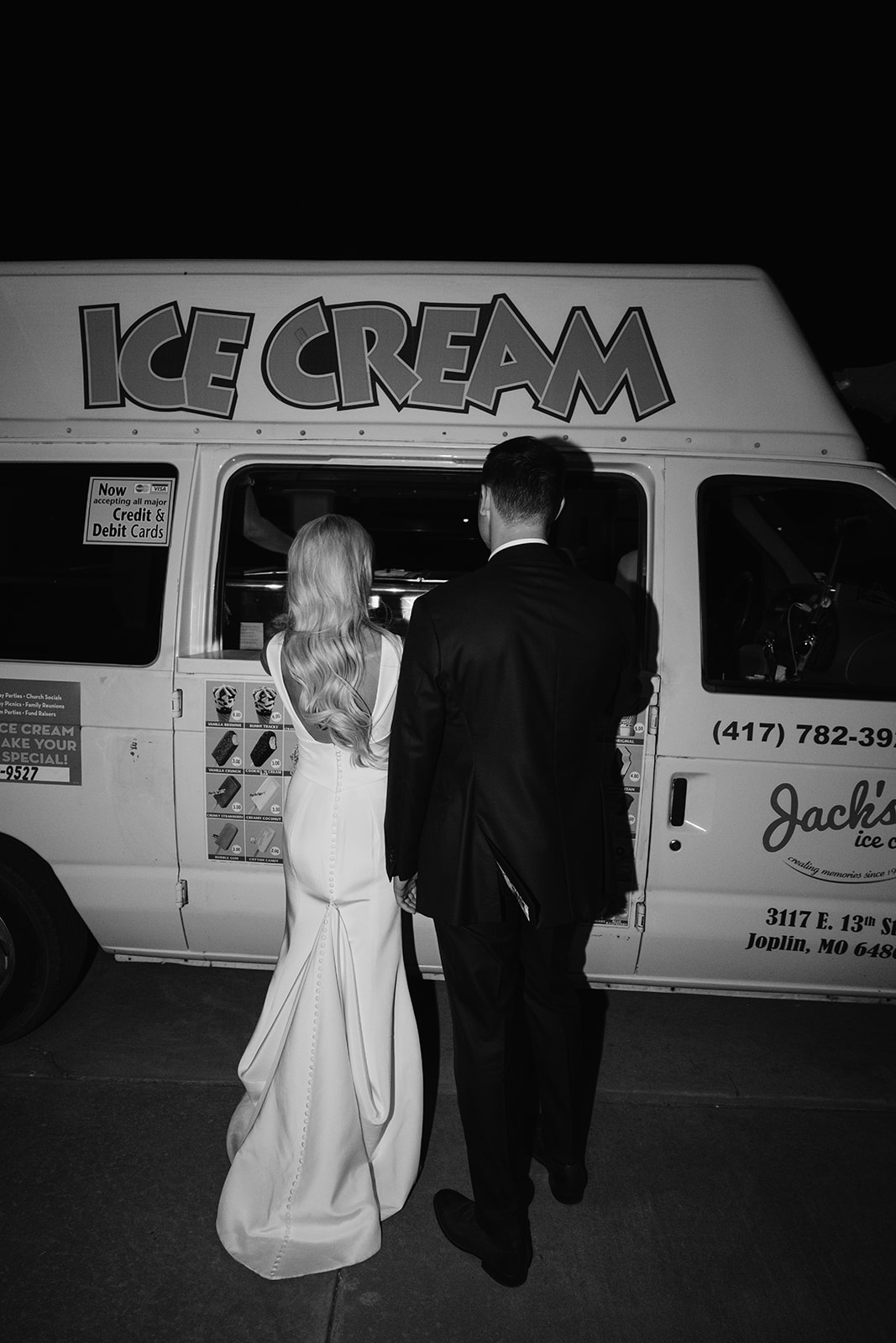 ice cream truck with bride and groom