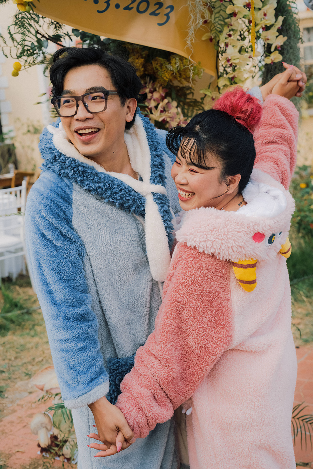 couple celebrate their wedding in teddy suits