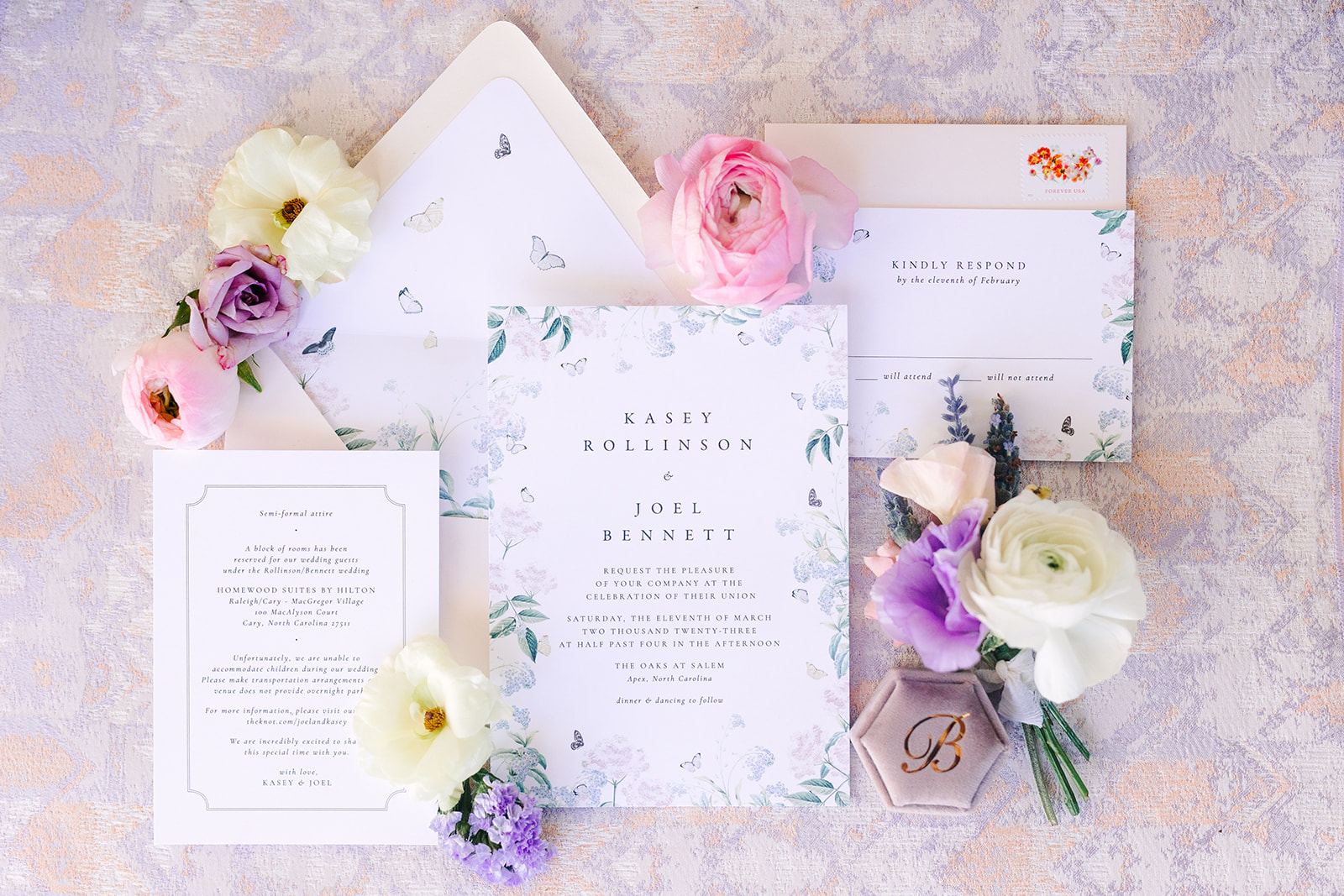 Flat lay detail of an invitation suite