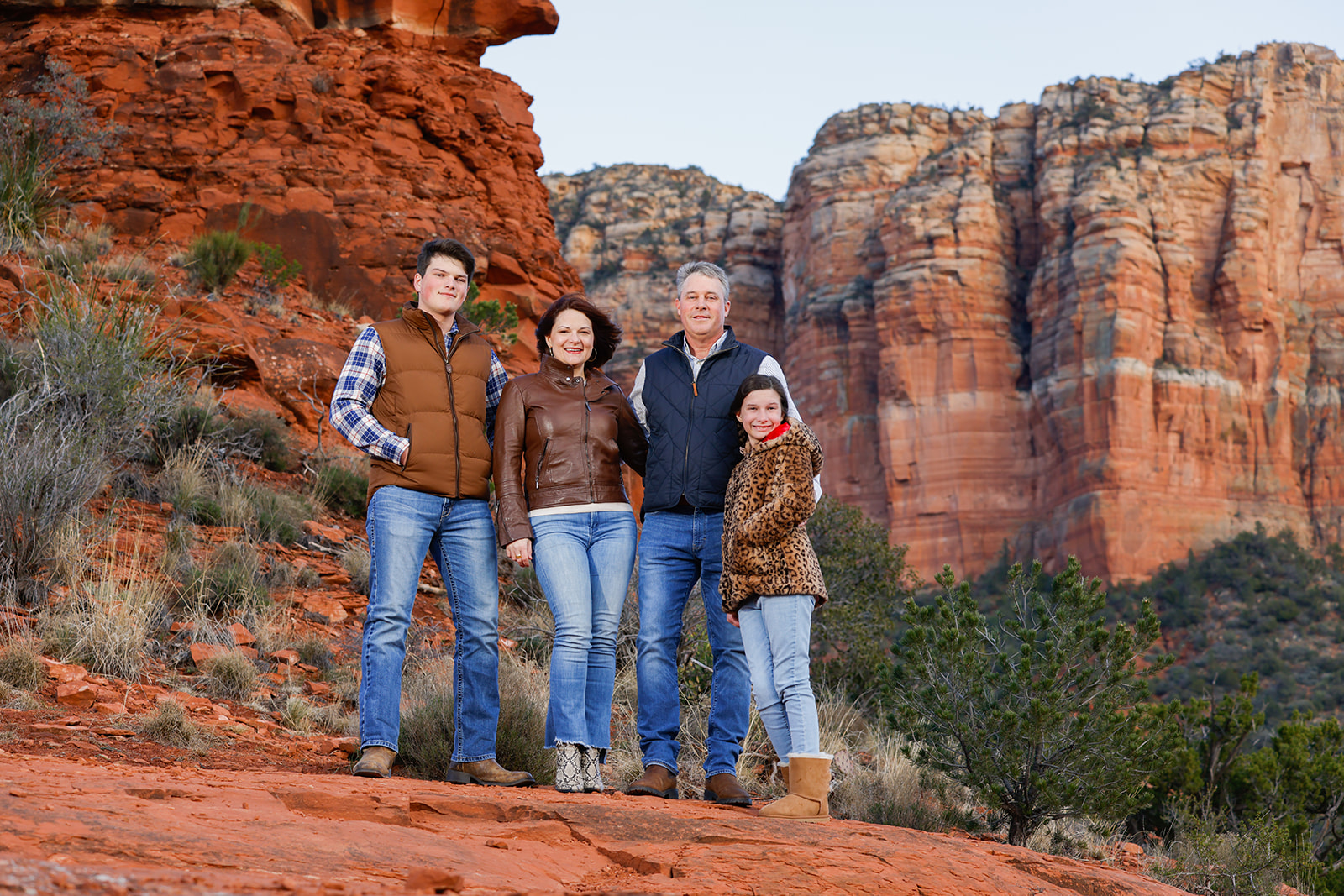 Classic Sedona family portrait session in the red rocks with photographer Heather Kadar