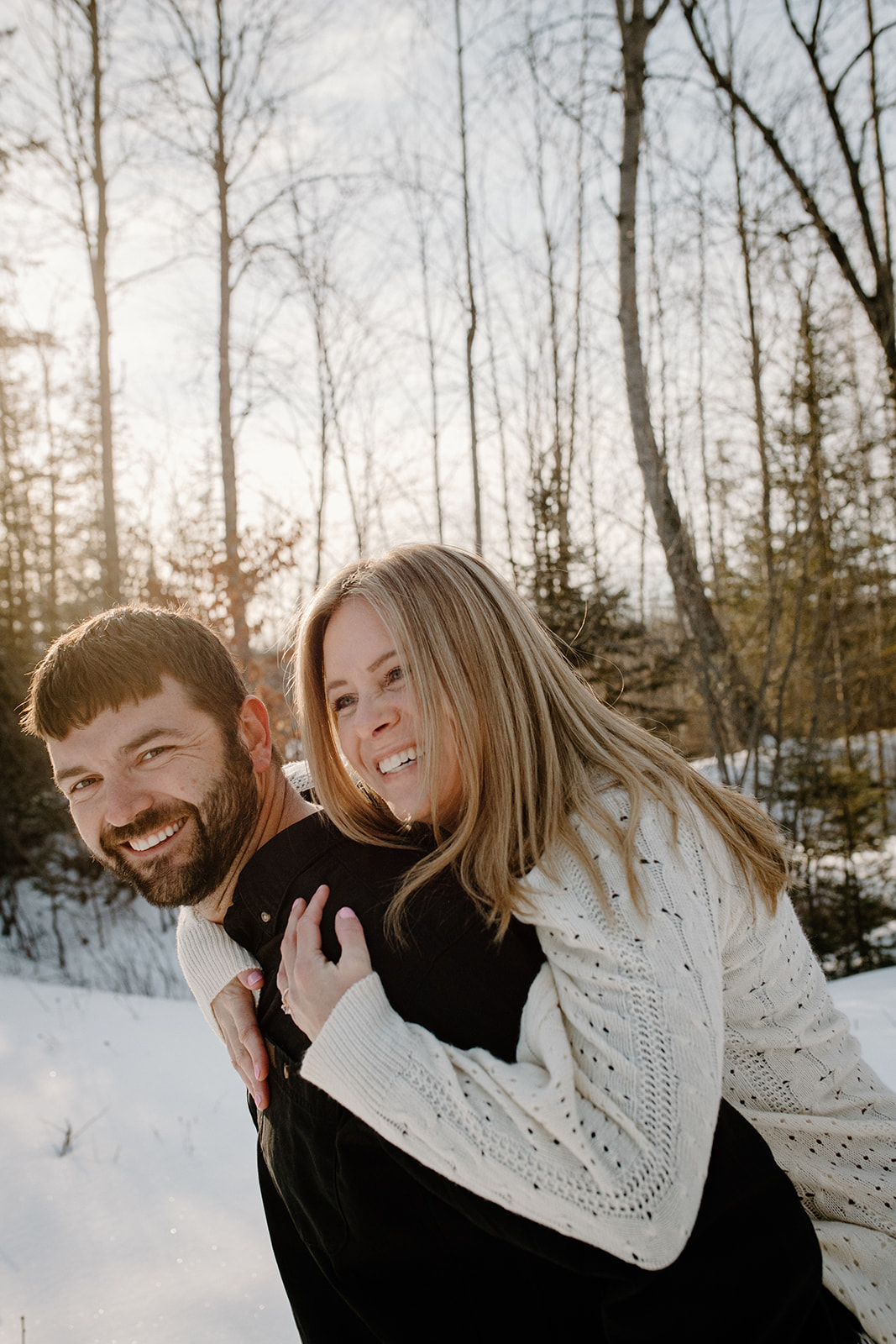 Couple's engagement photos taken on future property in Escanaba, Michigan