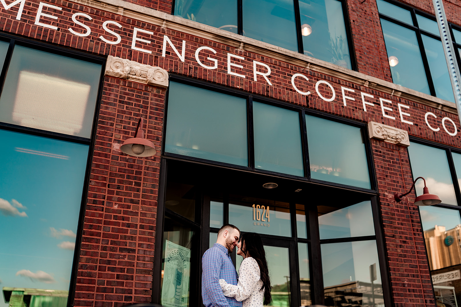 Engagement photos of couple at Messenger Coffee in Kansas City
