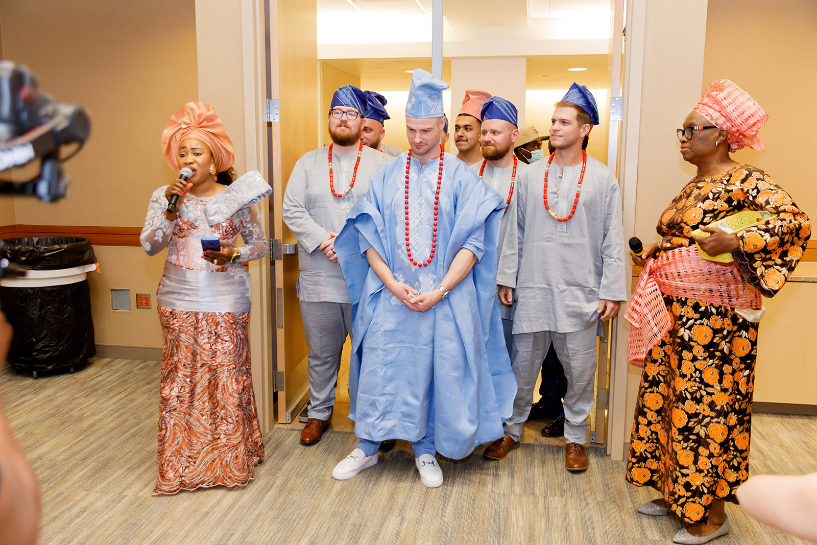 Groom and groomsmen entrance during Nigerian and American traditional wedding at Truhlsen Campus Events Center at UNMC