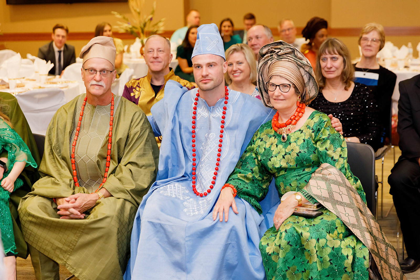 Groom with his parents during Nigerian and American traditional wedding at Truhlsen Campus Events Center at UNMC