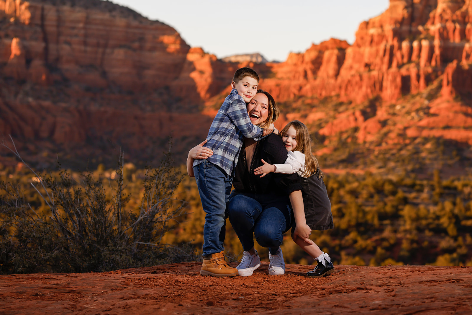 Sedona family portrait photographer, classic fun, natural outdoor photo session in the red rocks of Arizona, mother kids