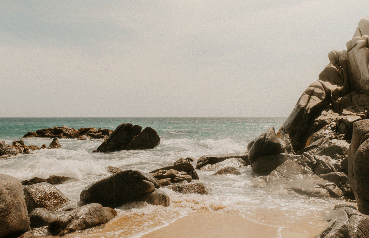 Waves crashing on the rocks in Cabo San Lucas, Mexico
