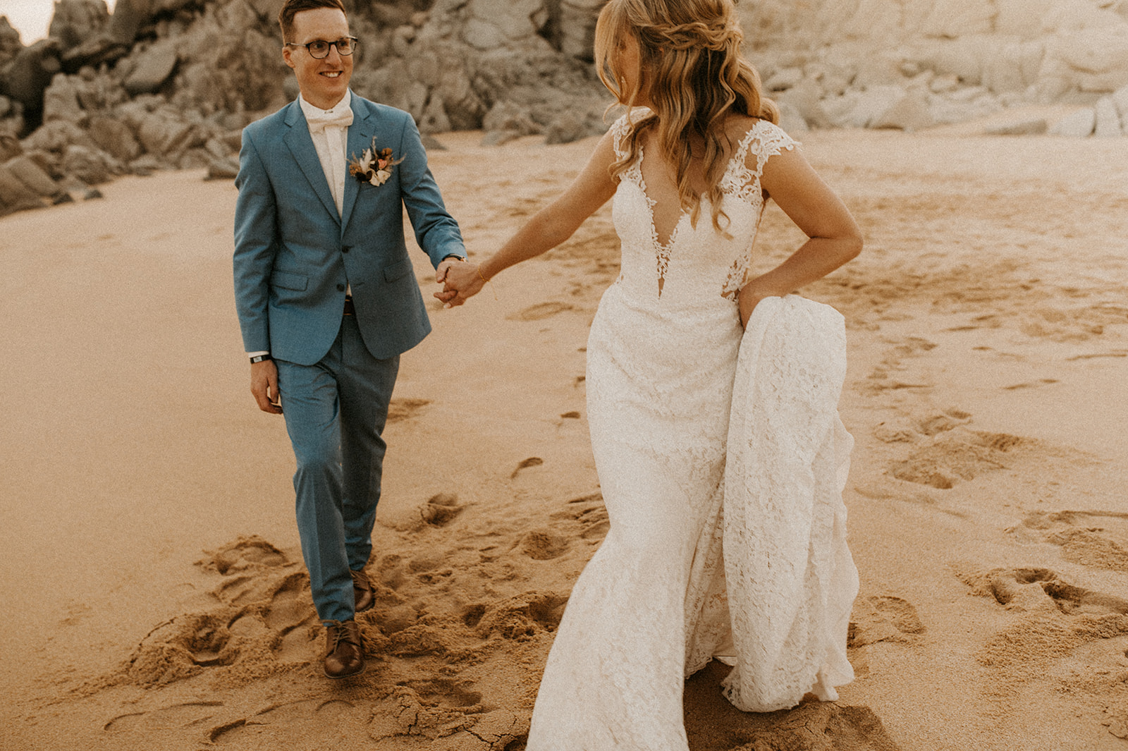 Bride and groom portraits on the beach in Cabo, Mexico