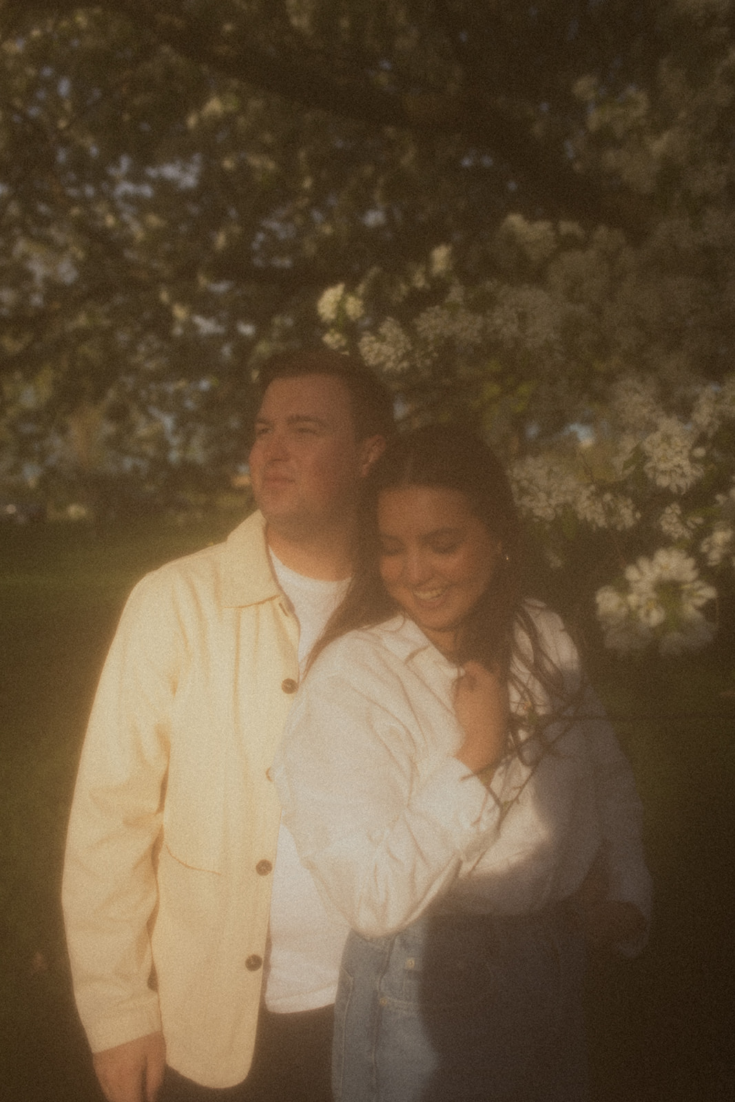 nostalgic couple holding hands at lyndale rose garden Minneapolis