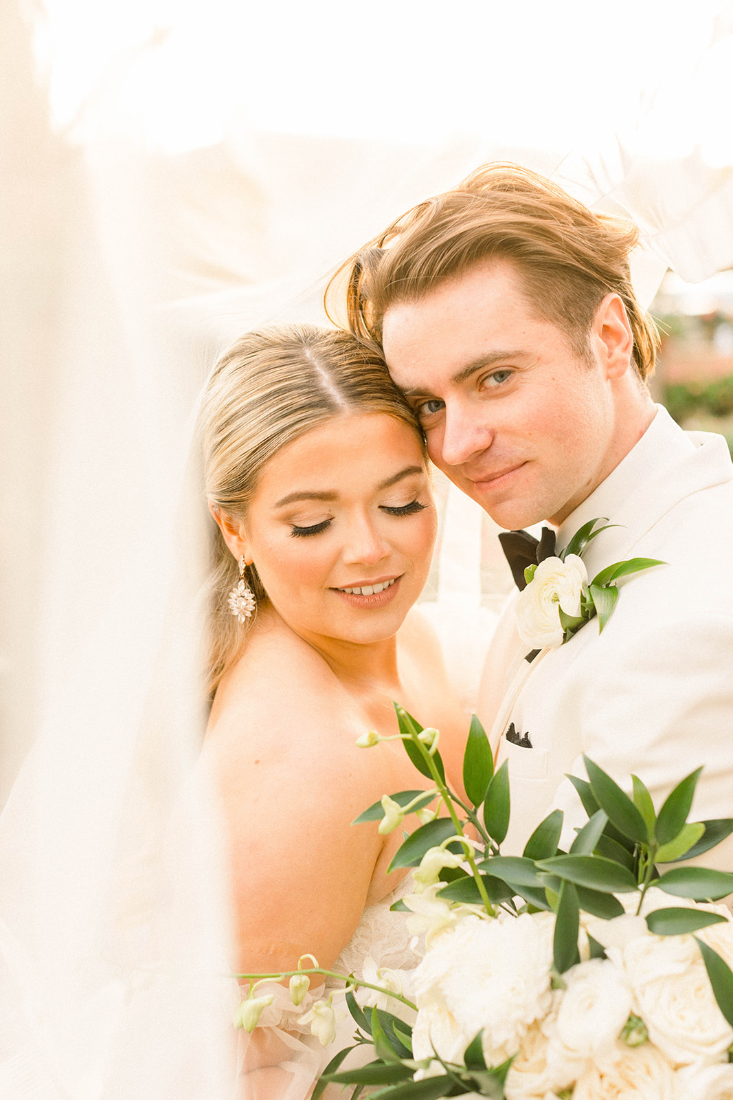 bride and groom in light and airy southern wedding