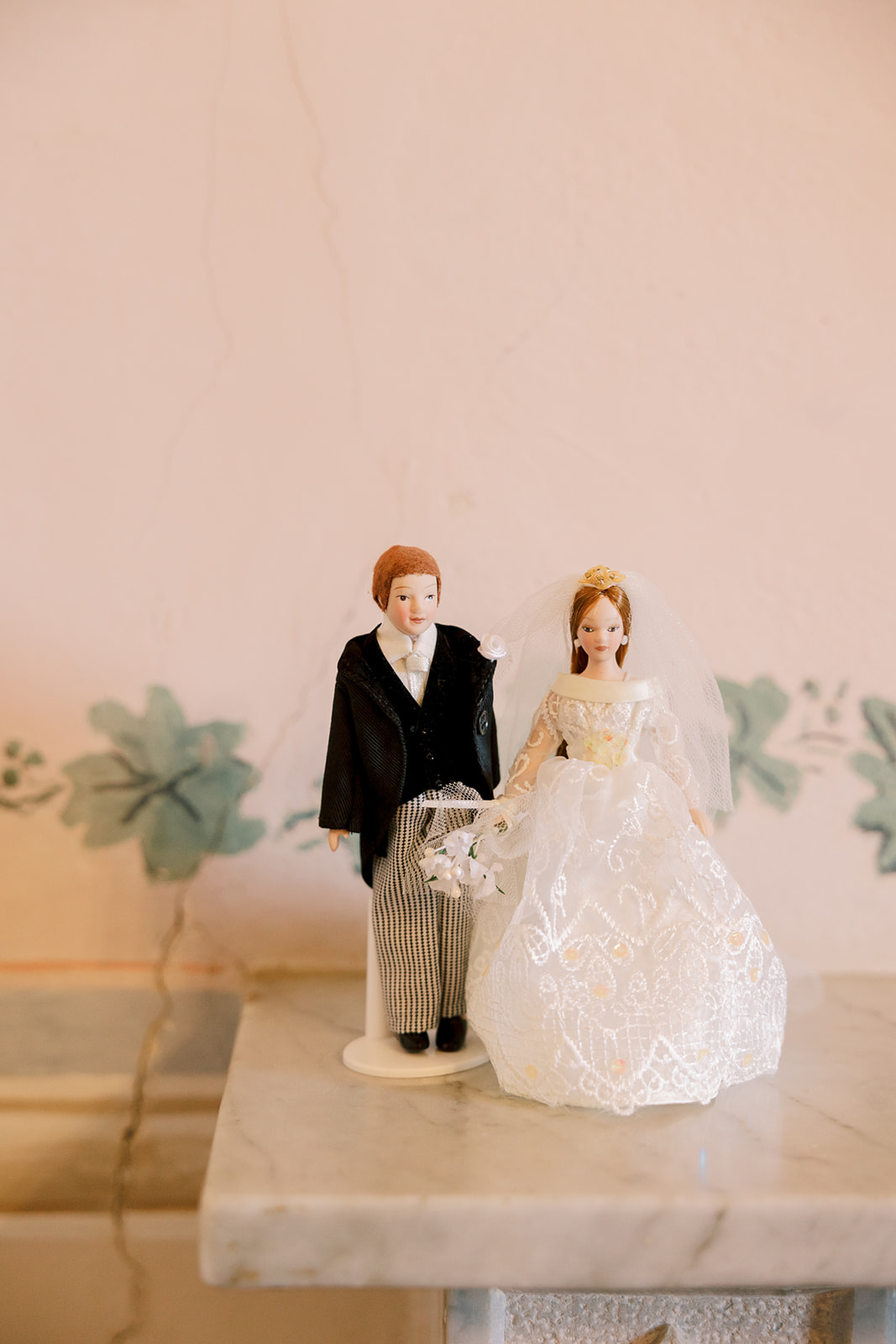 wedding cake topper of bride and groom