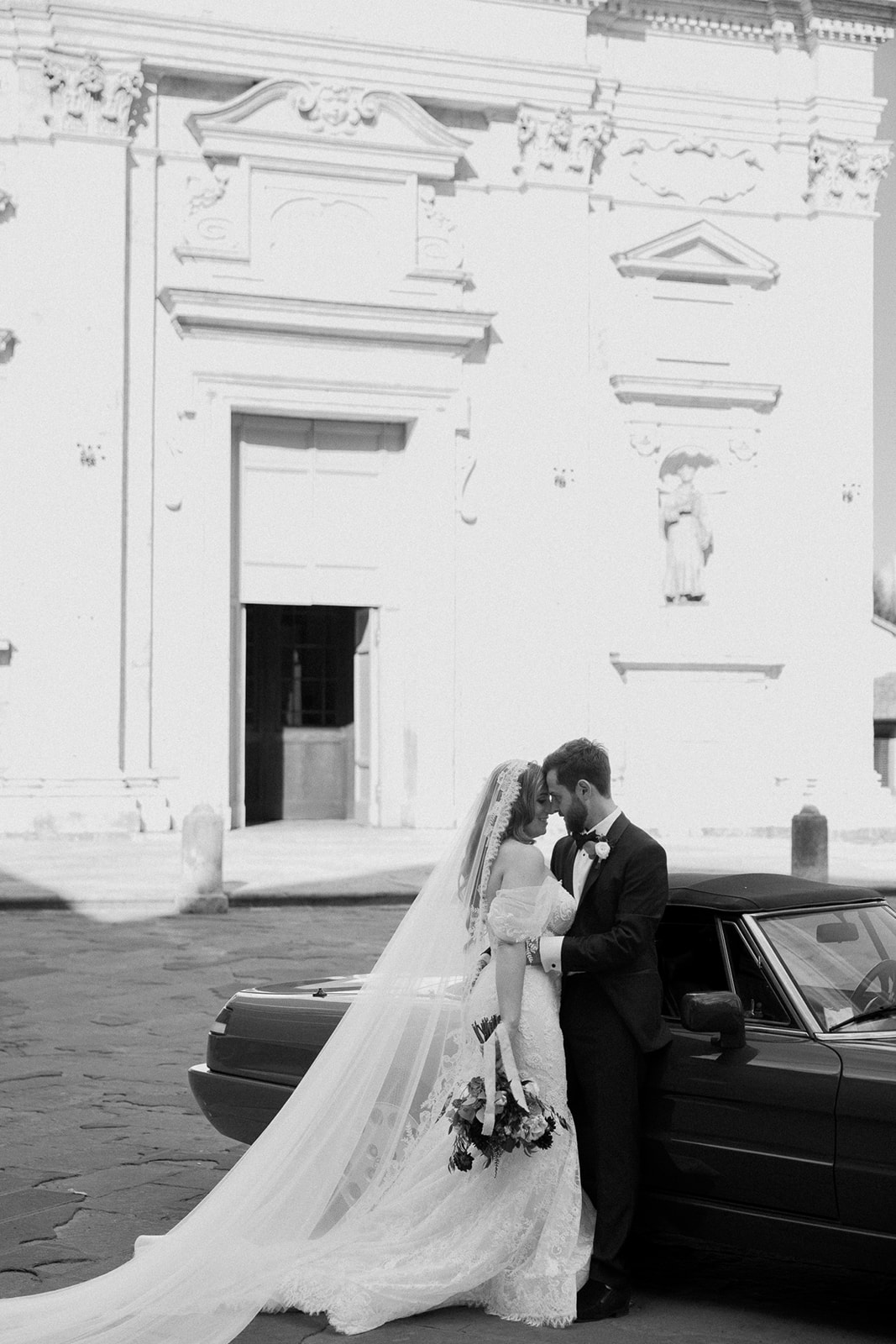 Bride and groom walk Italian streets