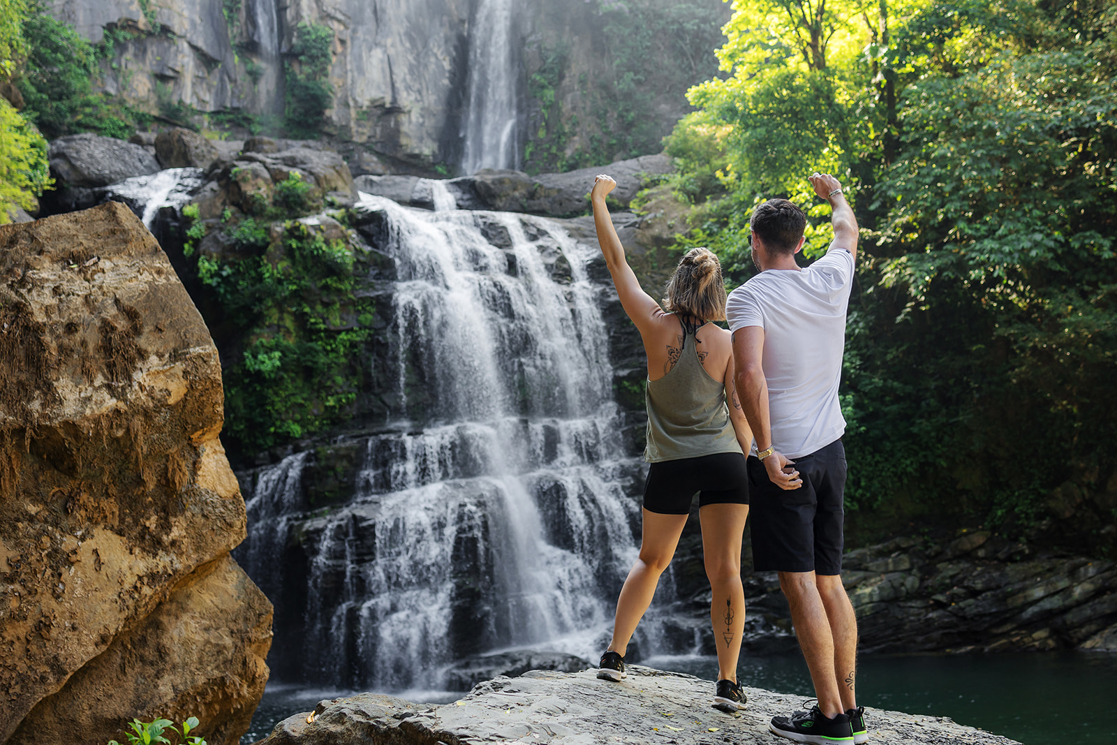 couple at waterfall in costa rica