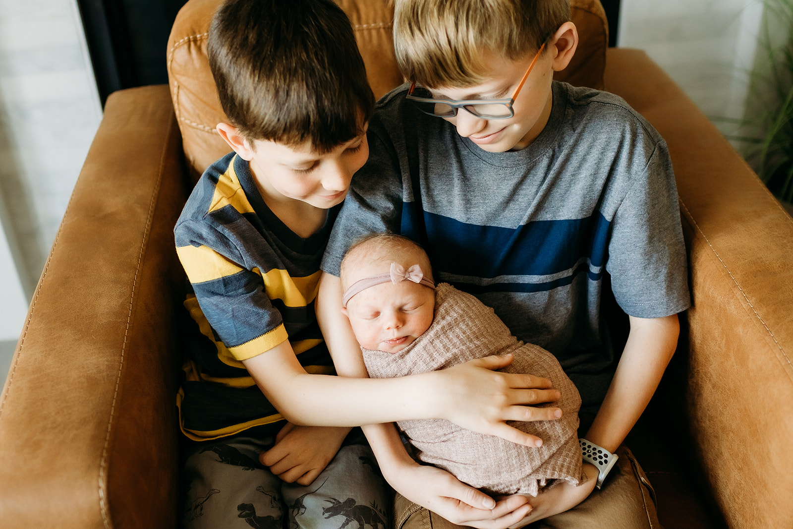 Denver school-age children in a newborn photoshoot