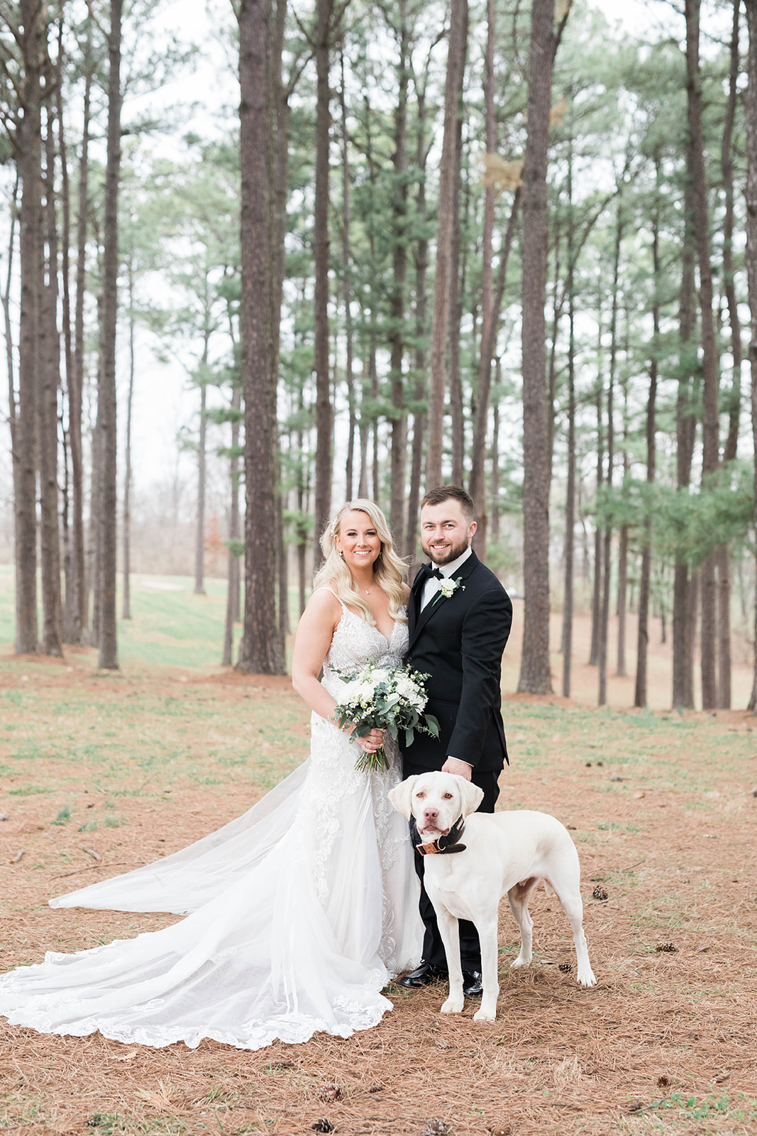 Couple and dog on wedding day
