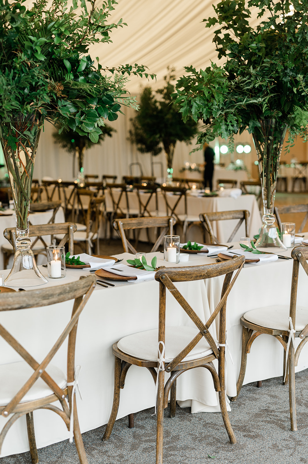 Lush tablescapes with rustic chairs and bountiful local Oregon greenery