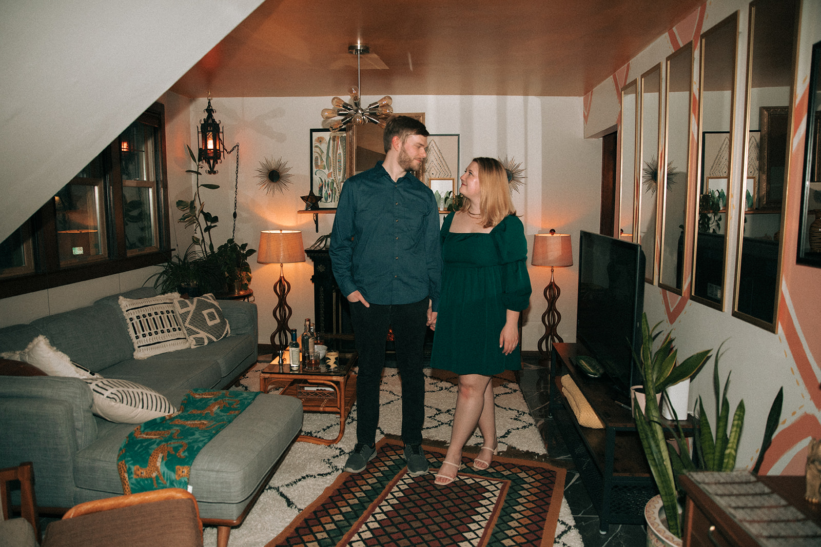Direct flash engagement pictures in the living room of a Milwaukee airbnb