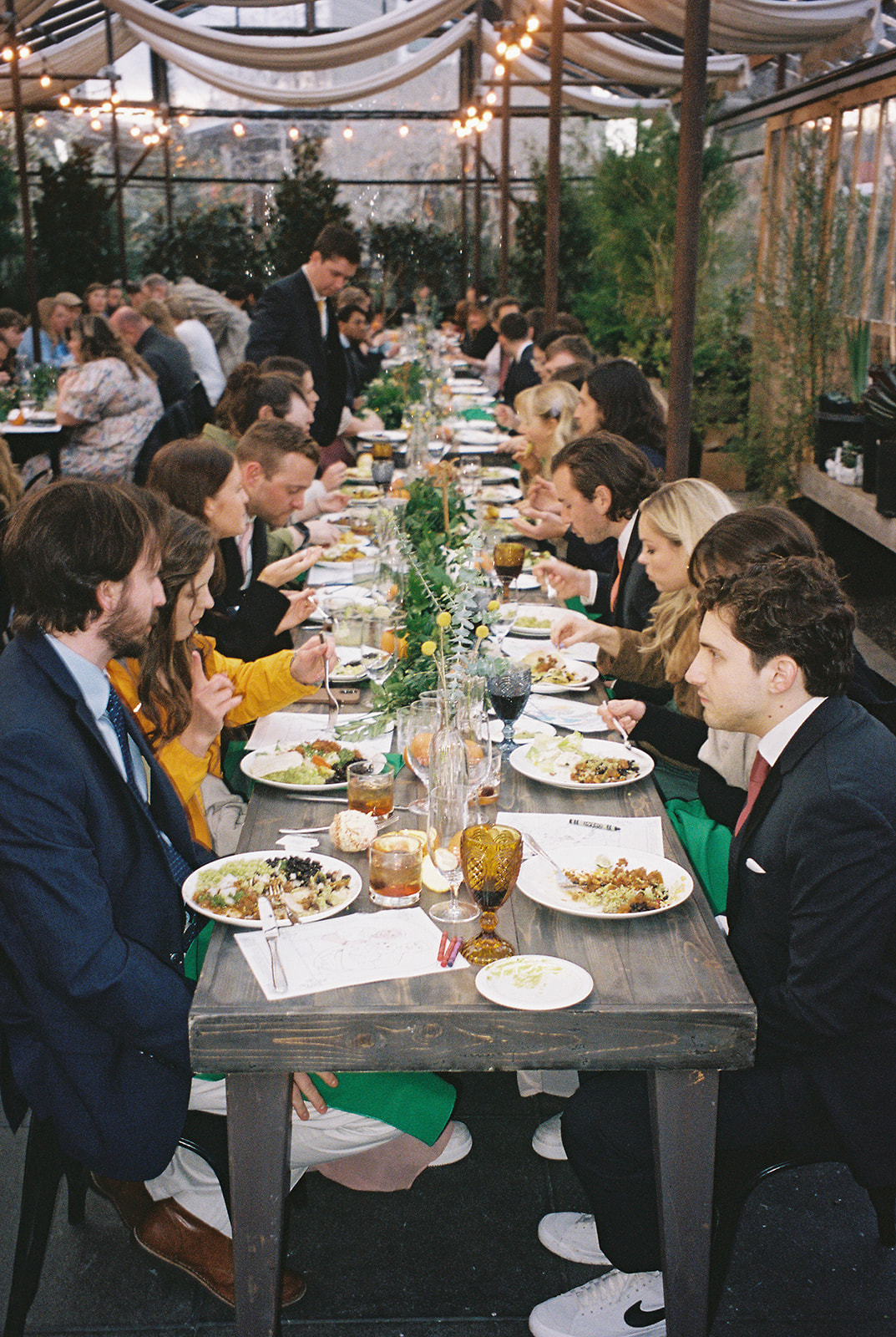35mm film image of guests eating dinner at Blockhouse PDX