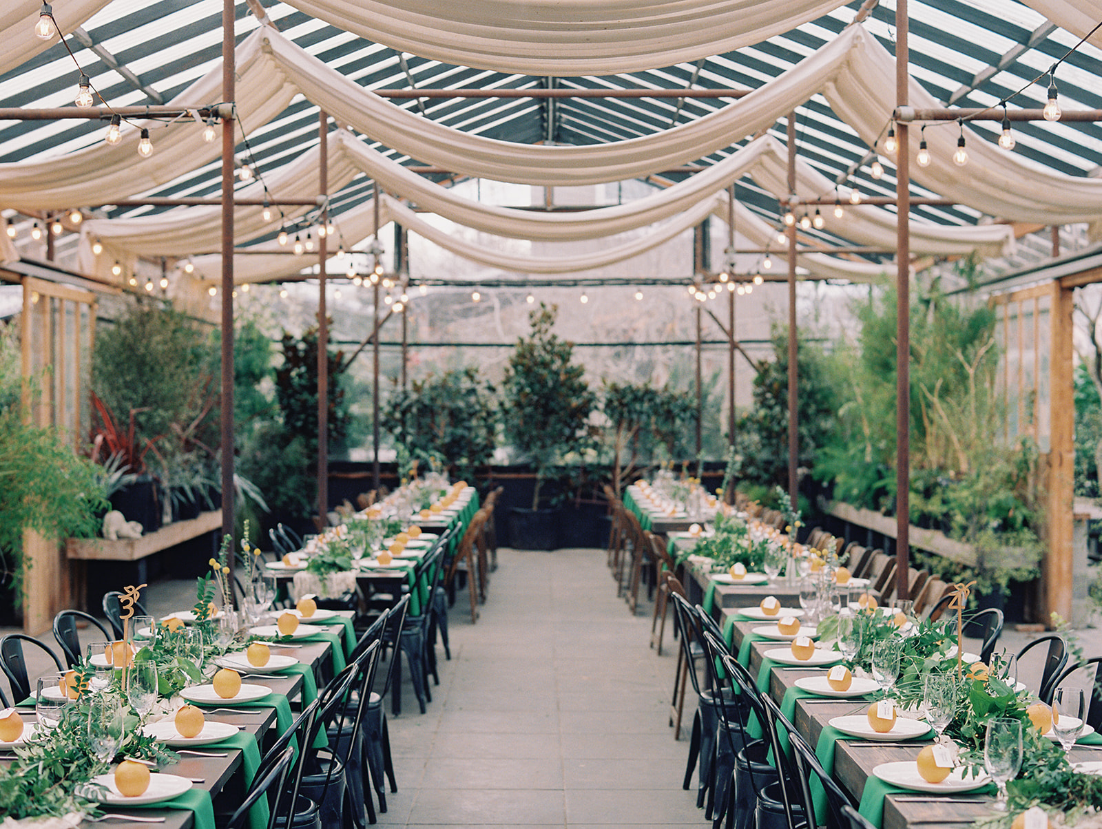Colorful reception table details in a greenhouse at Blockhouse PDX