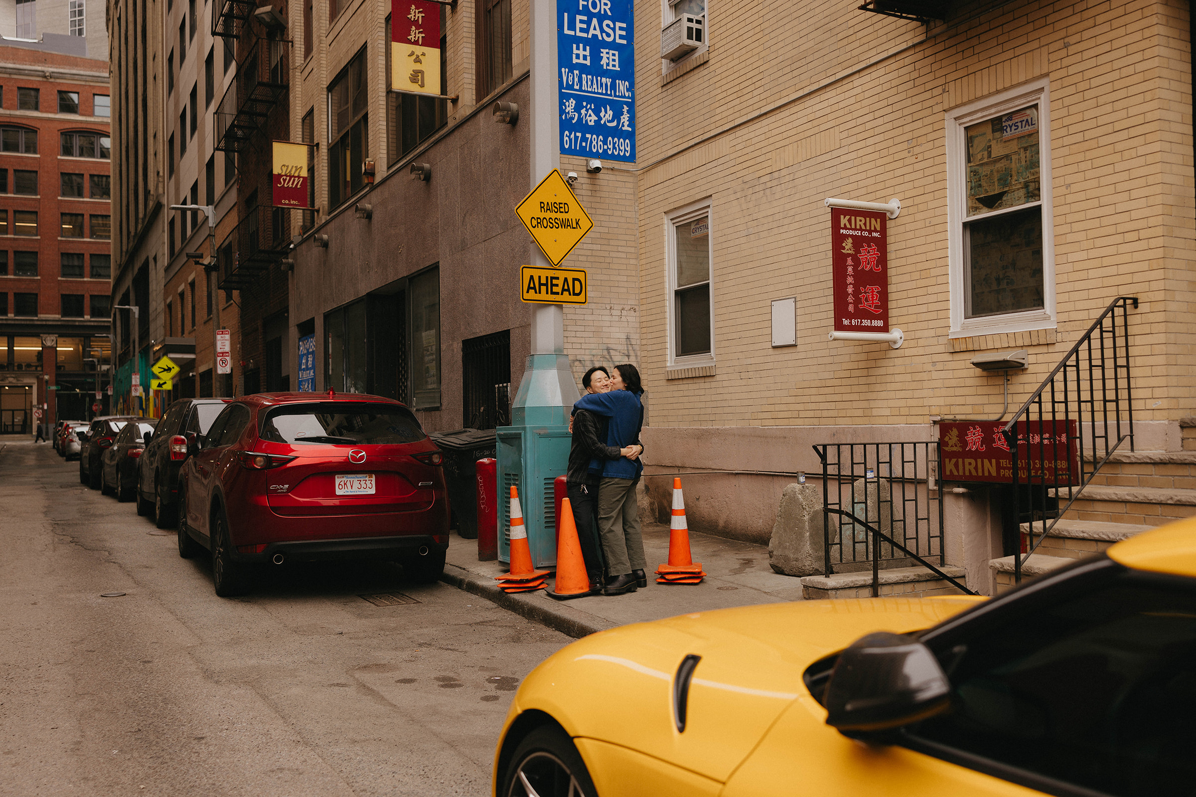 Julie & Soo Bin embrace in this iconic boston chinatown engagement photo location