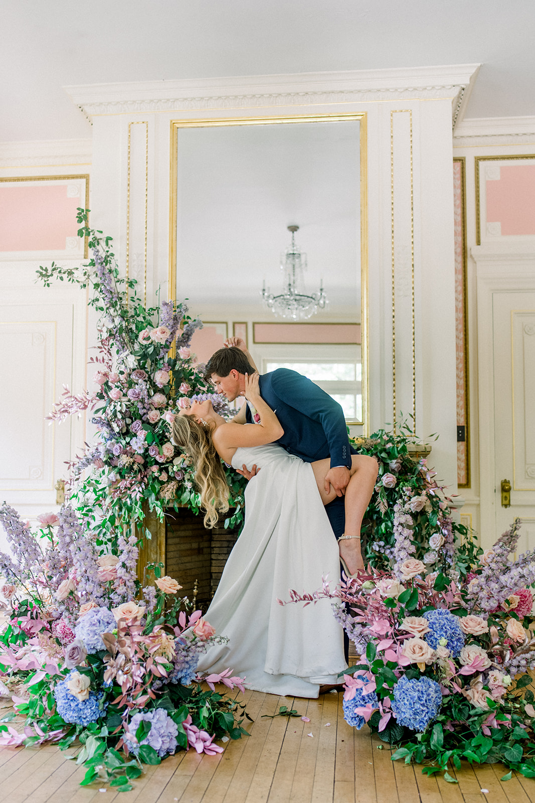 Bride and groom sharing a romantic kiss, showcasing a luxury destination wedding at Cairnwood Estate