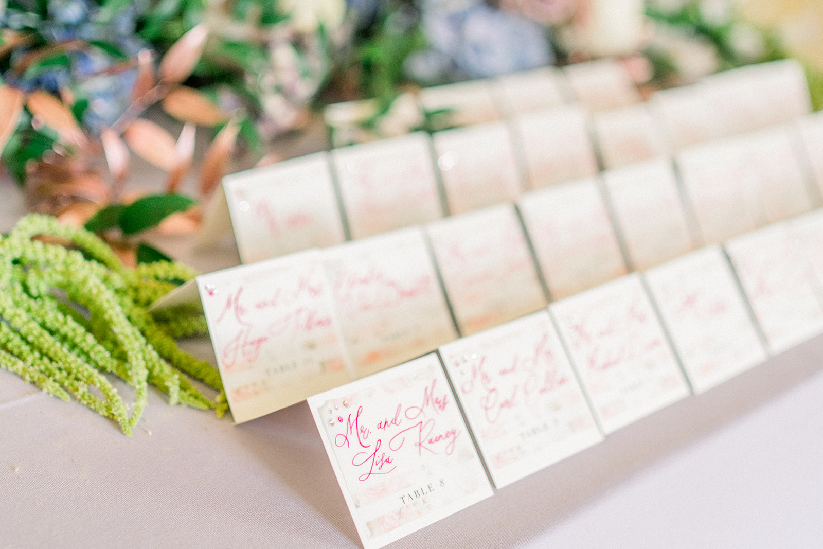 Custom destination wedding favor tags with calligraphy adding a personal touch to a luxury wedding