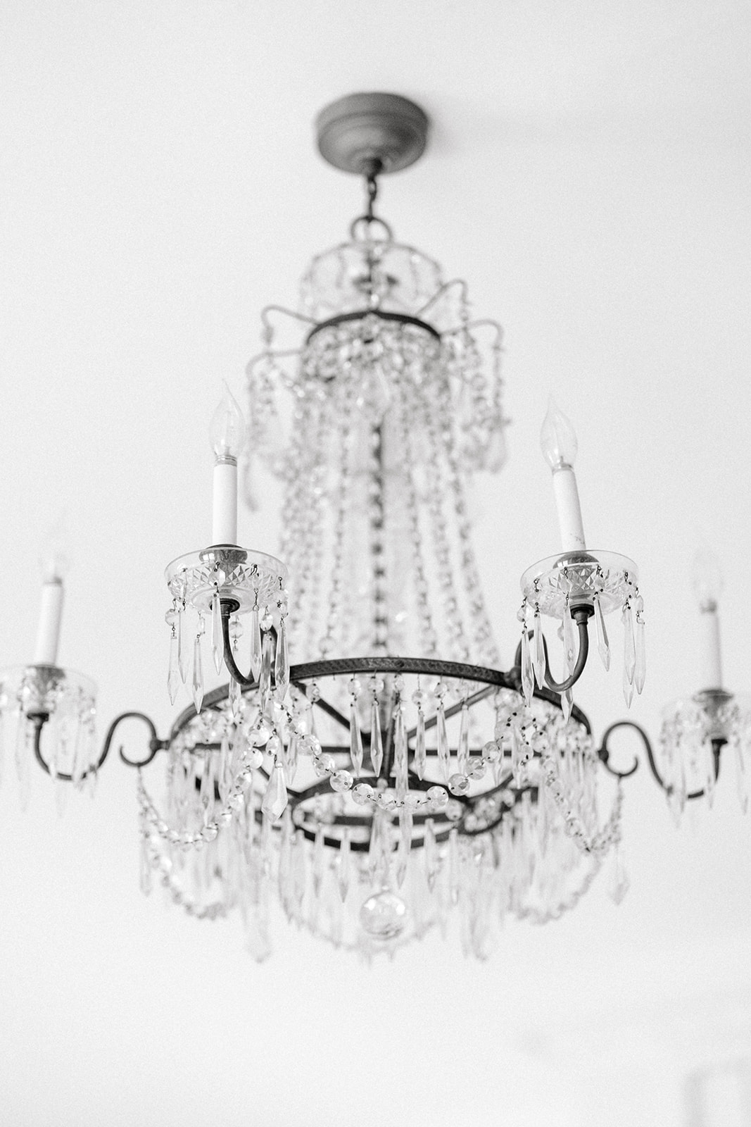 Elegant crystal chandelier at historic wedding venue Cairnwood Estate