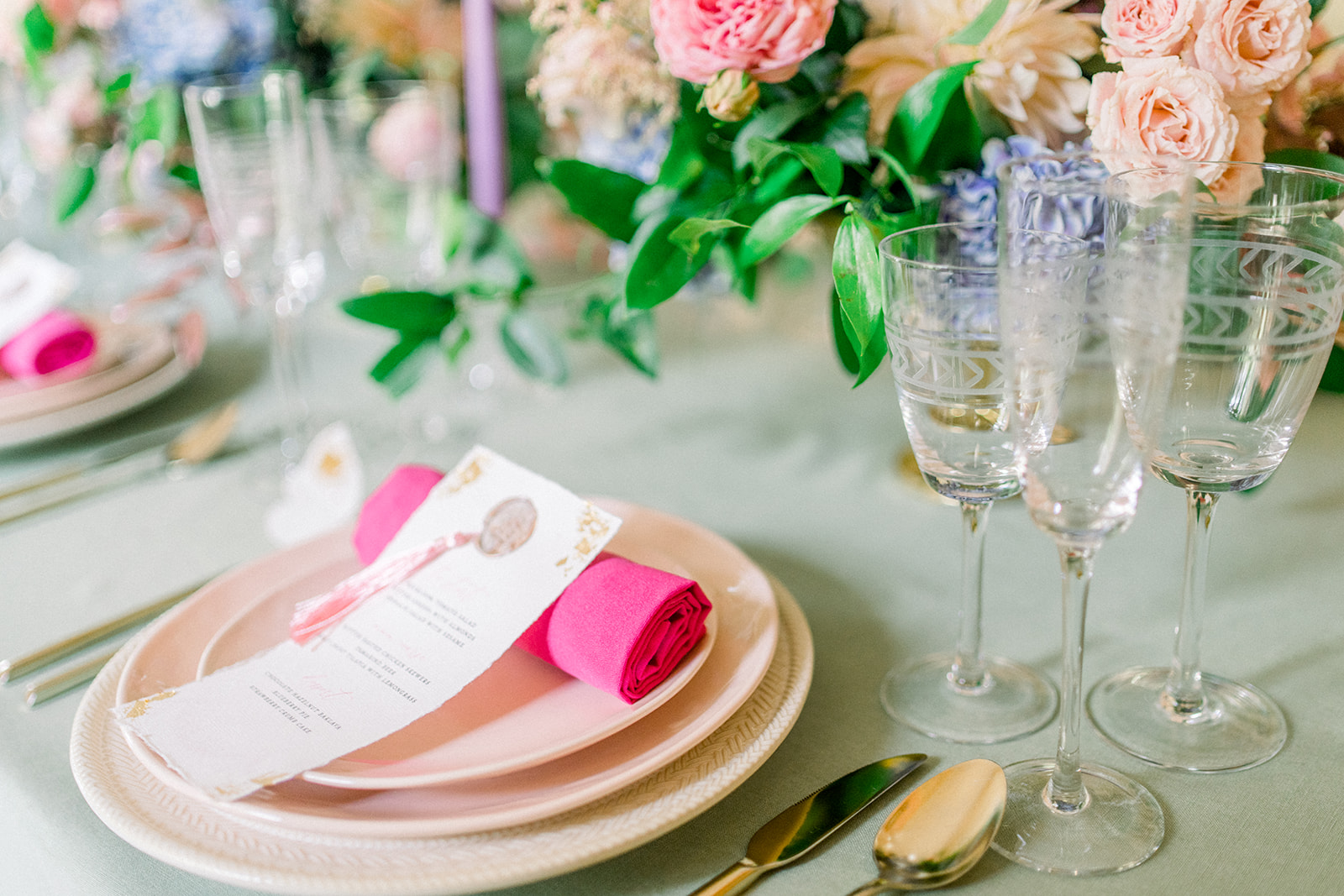 Elegant pink and green wedding place settings at Cairnwood Estate