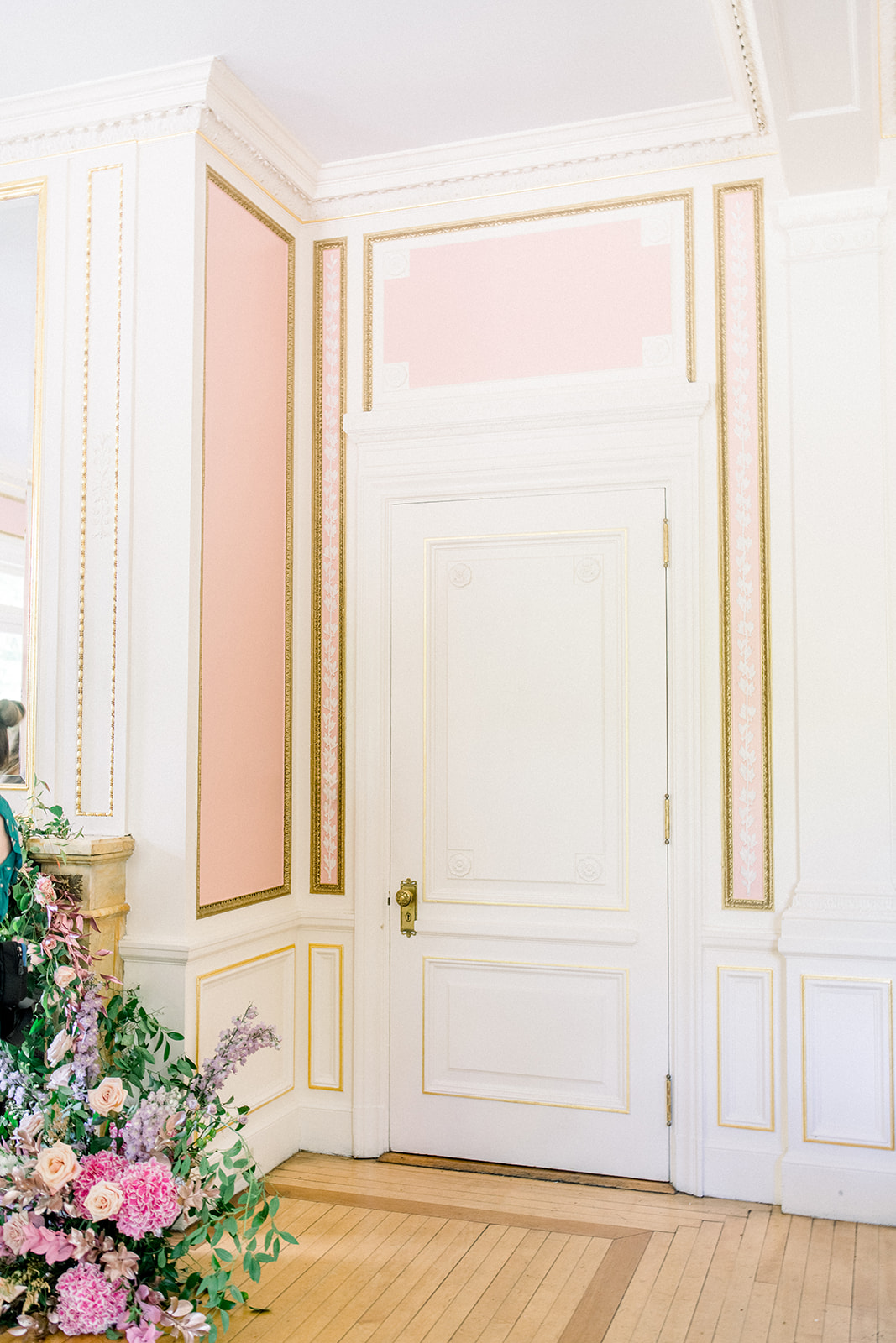 historic white door on white wall at luxury destination wedding