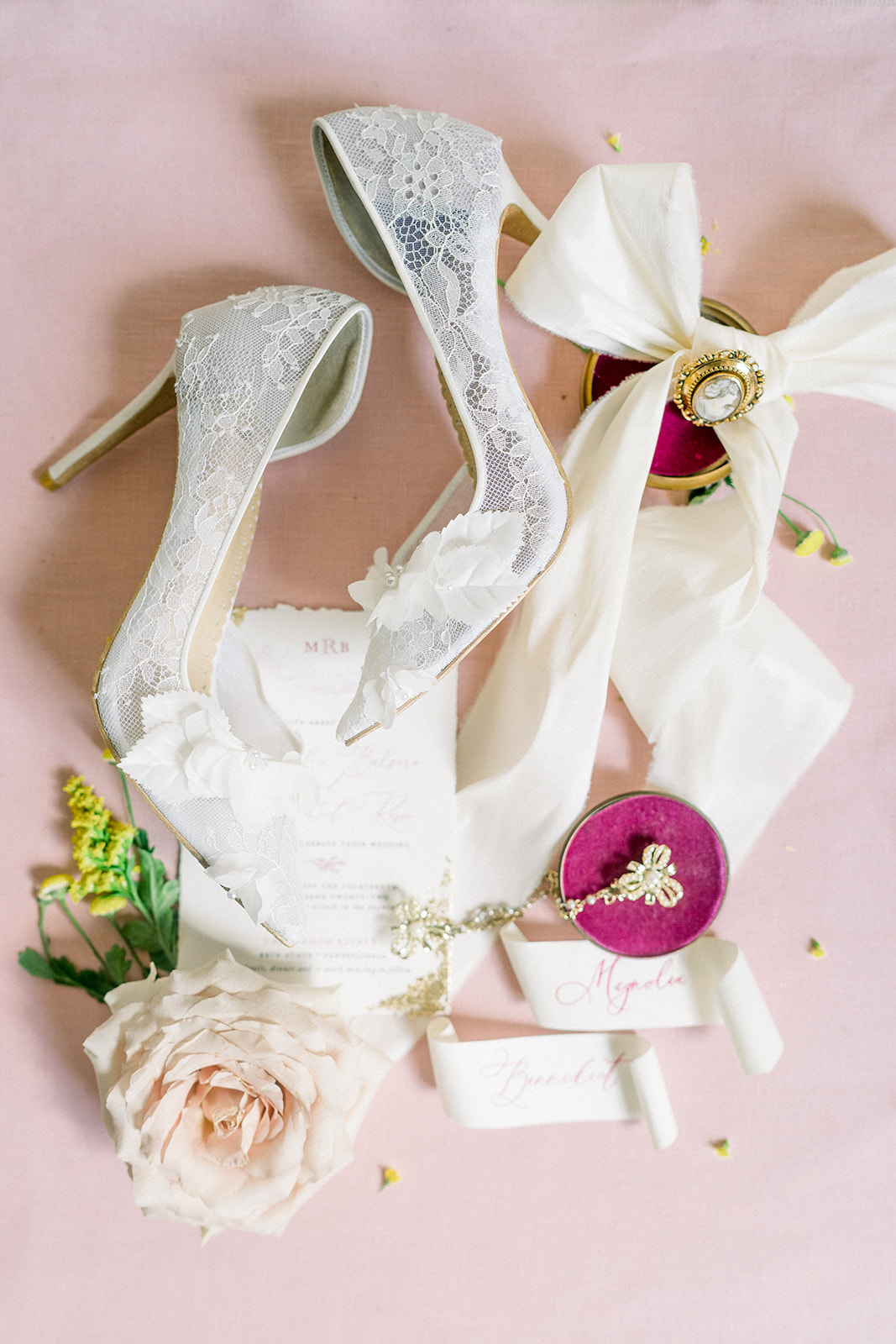 Intricate lace details on bridal shoes by Sachlirene, perfect for a luxury destination wedding.
