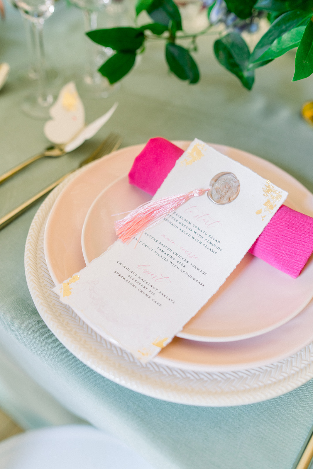  luxury destination wedding table setting gold cutlery, and an elegant invitation 